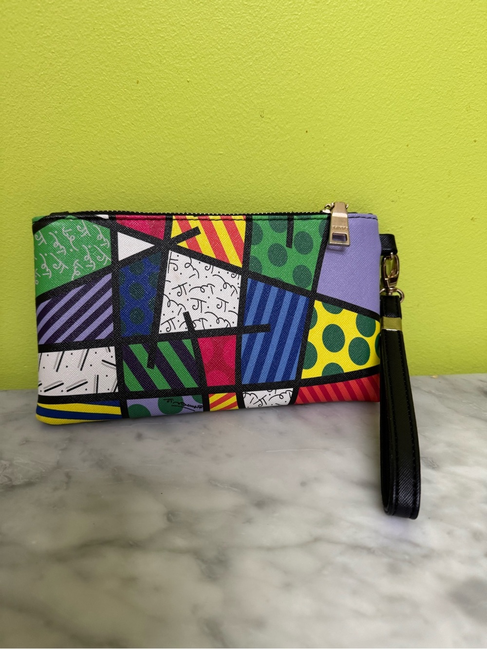 Brito Romero wristlet EUC